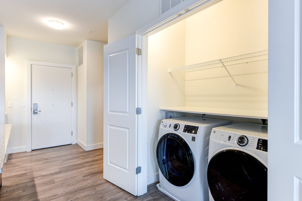 washer and dryer laundry closet in a Crest apartment