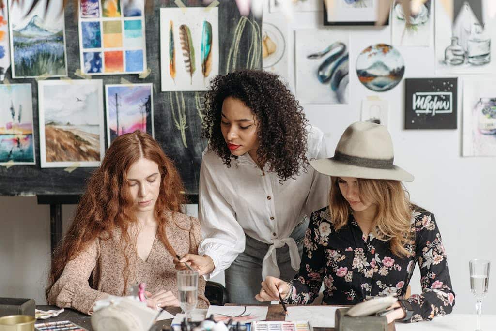 2 Women Sitting at Table